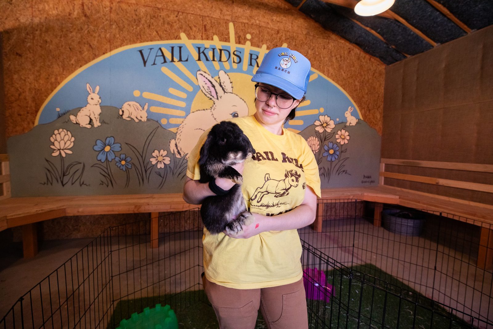 Holding a bunny at the Bunny Barn