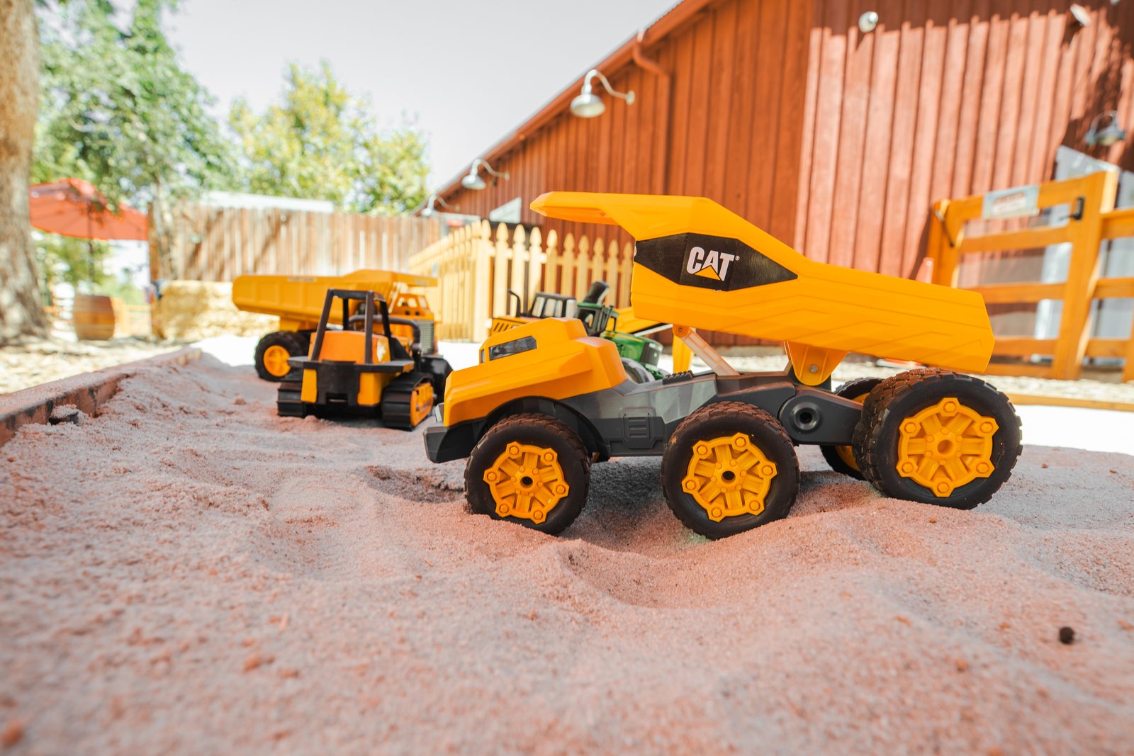 Sand play with trucks